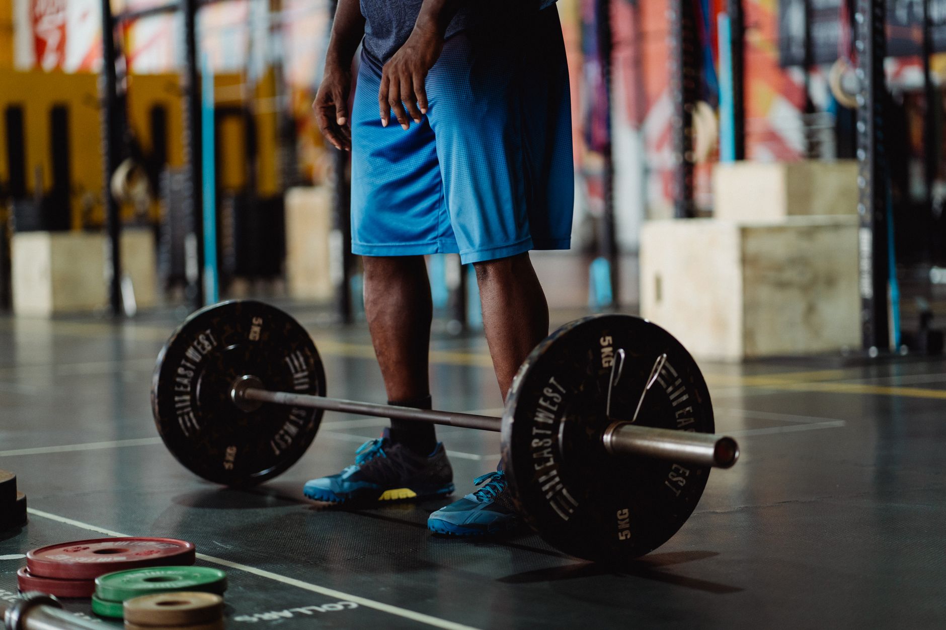Man performing a heavy deadlift with intense focus